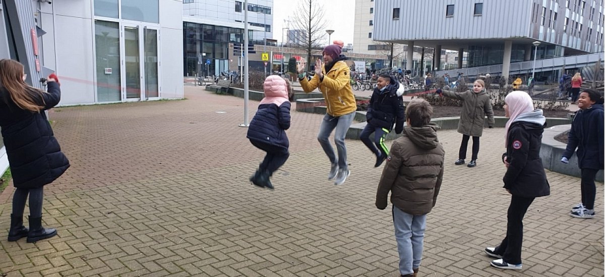  Playing in the schoolyard with the teacher